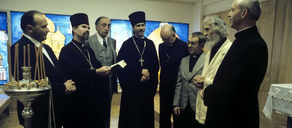 Священнослужители в здании Культурного центра Олимпийской деревни во время XXII летних Олимпийских игр - Sputnik Латвия