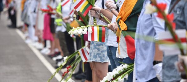 Акция в Вильнюсе в поддержку протестующих в Белоруссии Акция в Вильнюсе в поддержку протестующих в Белоруссии - Sputnik Latvija