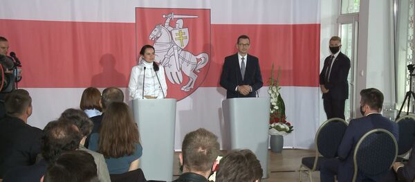 В Варшаве открылся Белорусский дом. Зачем это Тихановской и властям Польши? В Варшаве открылся Белорусский дом. Зачем это Тихановской и властям Польши? - Sputnik Латвия