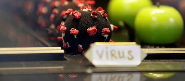 Пирожное в форме вируса SARS-CoV-2 в Праге Пирожное в форме вируса SARS-CoV-2 в Праге - Sputnik Latvija