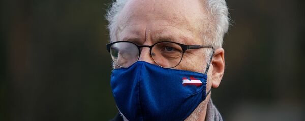 Президент Латвии Эгилс Левитс на Братском кладбище в Риге в День Лачплесиса - Sputnik Latvija