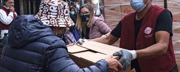 Раздача еды в День благодарения в США - Sputnik Латвия