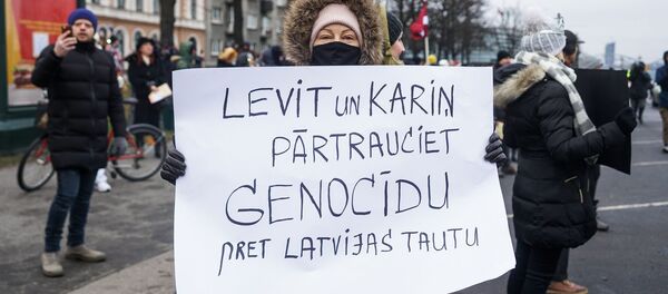 Акция протеста на набережной 11 Ноября в Риге.  Акция протеста на набережной 11 Ноября в Риге.  - Sputnik Latvija