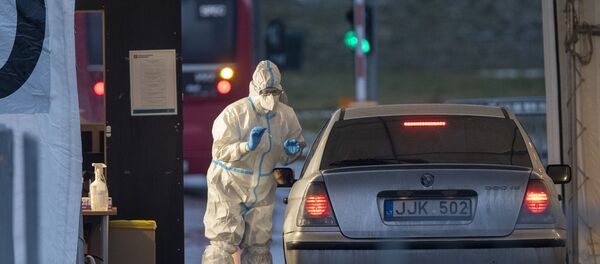 Мобильная станция тестирования на коронавирус в Вильнюсе Мобильная станция тестирования на коронавирус в Вильнюсе - Sputnik Латвия