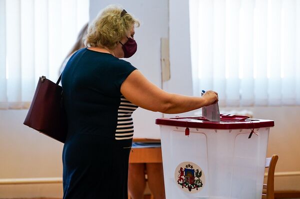 В обоих городах больше всего голосов набрал Союз зеленых и крестьян (СЗК). - Sputnik Латвия