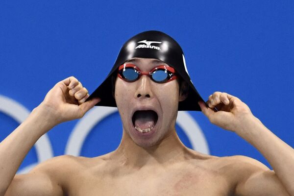 Японский пловец Хагино Косукэ готовится к участию в полуфинале мужского заплыва на 200 м вольным стилем во время соревнований по плаванию на Олимпийских играх в Рио-де-Жанейро, 7 августа 2016 года. - Sputnik Латвия