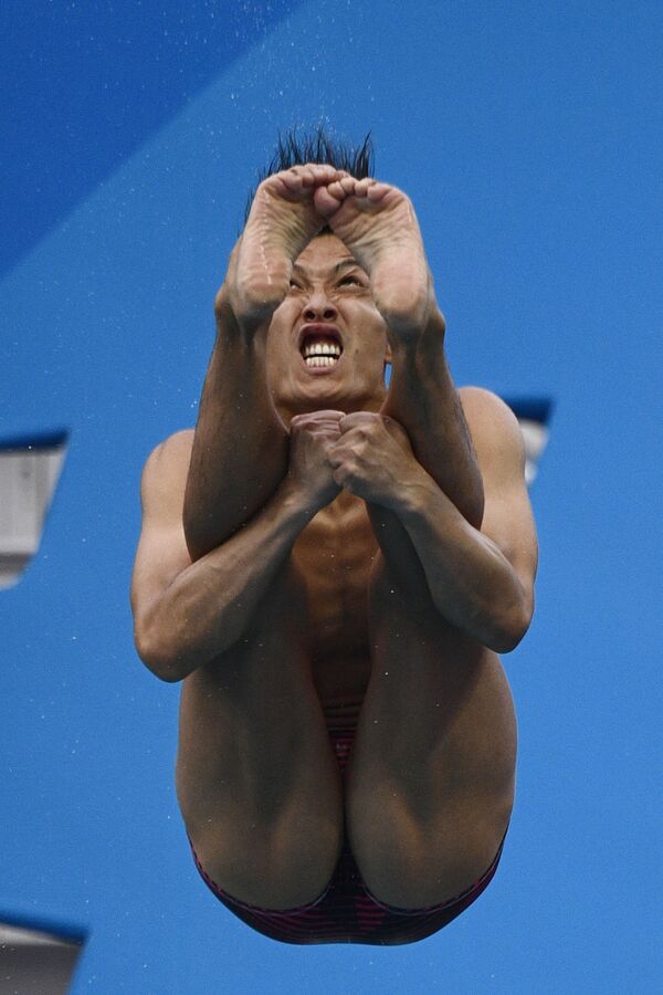 Японский прыгун в воду Ken Terauchi на Олимпийских играх в Рио-де-Жанейро, 15 августа 2016 года. - Sputnik Латвия