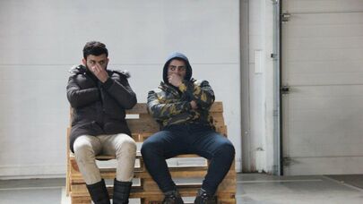 Мигранты в логистическом центре