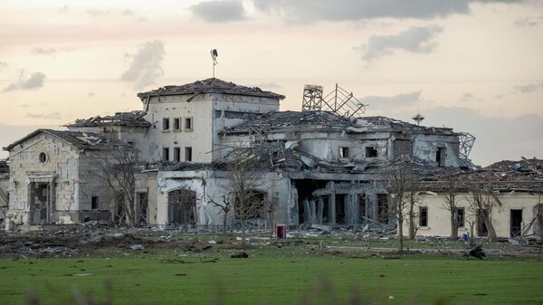 Здание, поврежденное в результате обстрела иранскими баллистическими ракетами, Эрбиль, Ирак, 13 марта 2022 года - Sputnik Латвия