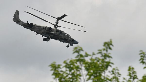 Работа вертолета Ка-52 группировки Юг в зоне спецоперации - Sputnik Латвия
