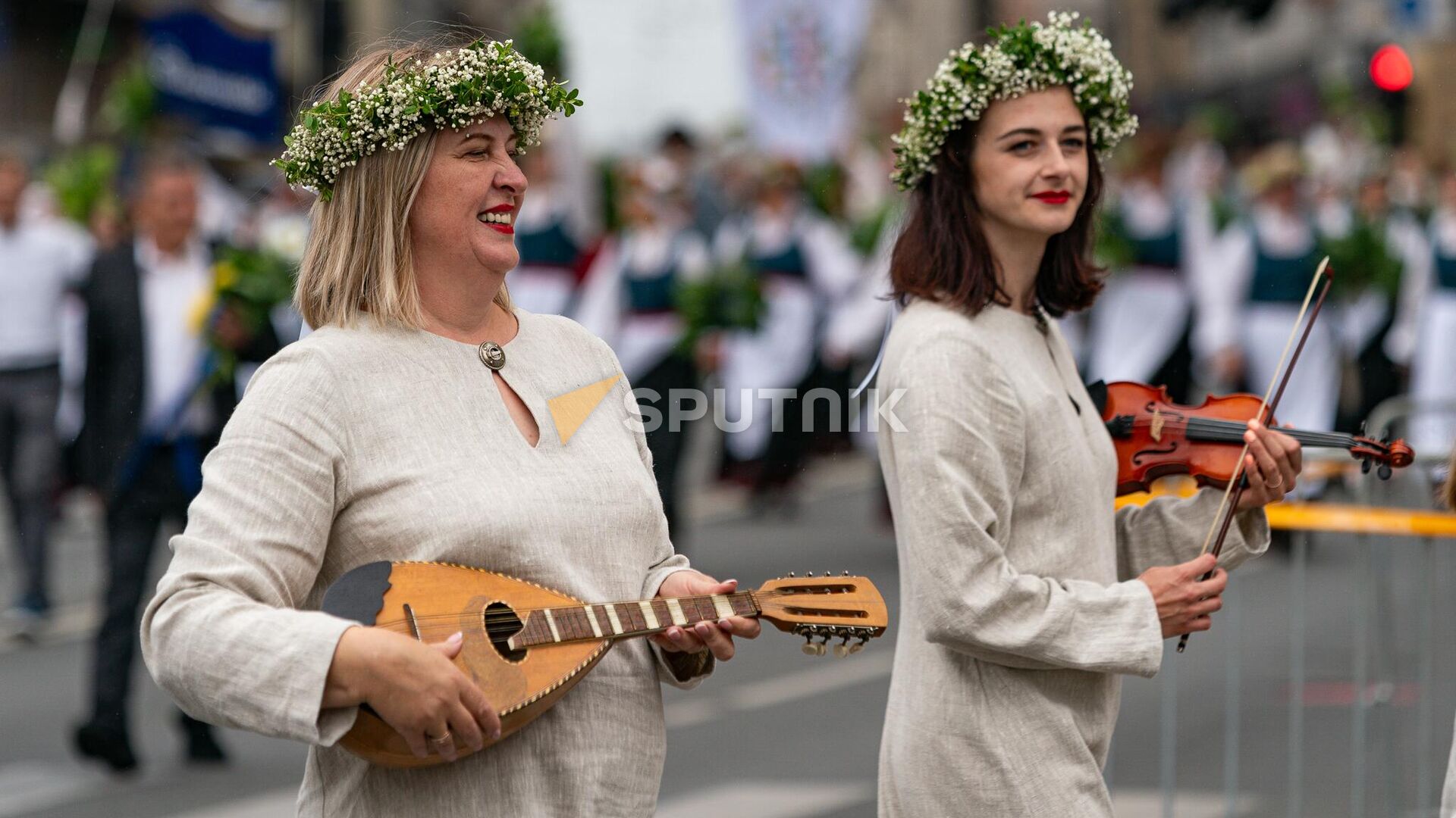 Традиционное шествие участников Праздника песни и танца в Риге - Sputnik Латвия, 1920, 03.11.2023