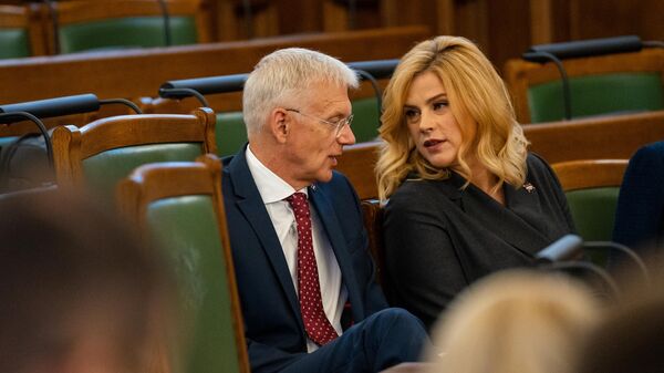 Премьер-министр Латвии Эвика Силиня и министр иностранных дел Латвии Кришьянис Кариньш - Sputnik Латвия