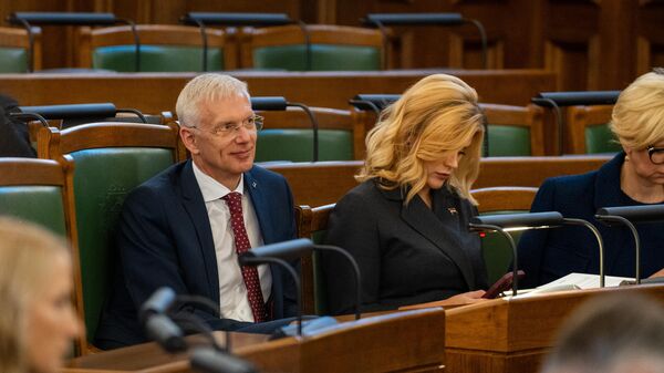 Премьер-министр Латвии Эвика Силиня и министр иностранных дел Латвии Кришьянис Кариньш - Sputnik Латвия