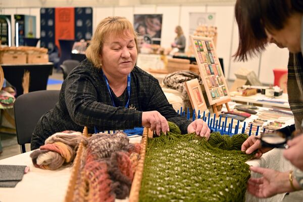 На фото: участники туристической выставки в Вильнюсе. - Sputnik Латвия