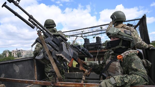Военнослужащие ВС России в зоне СВО - Sputnik Латвия