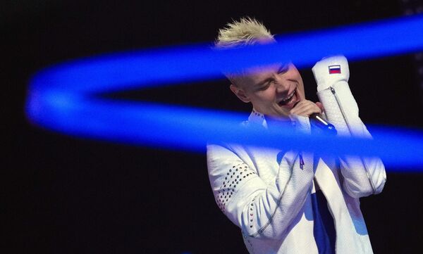 Россия: ShamanПесня: "Прямо по сердцу"Ярослав Дронов, с 2020 года выступающий под сценическим псевдонимом SHAMAN, многим запомнился по шоу "Фактор А" и "Голос". Исполнитель композиций "Встанем", "Я русский", всего в его дискографии 53 сингла. В 2024 году певцу было присвоено звание заслуженного артиста Российской Федерации. Россия: ShamanПесня: "Прямо по сердцу"Ярослав Дронов, с 2020 года выступающий под сценическим псевдонимом SHAMAN, многим запомнился по шоу "Фактор А" и "Голос". Исполнитель композиций "Встанем", "Я русский", всего в его дискографии 53 сингла. В 2024 году певцу было присвоено звание заслуженного артиста Российской Федерации. - Sputnik Латвия