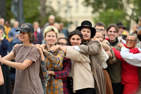 В Вильнюсе мероприятие прошло на площади Винцаса Кудирки. - Sputnik Латвия