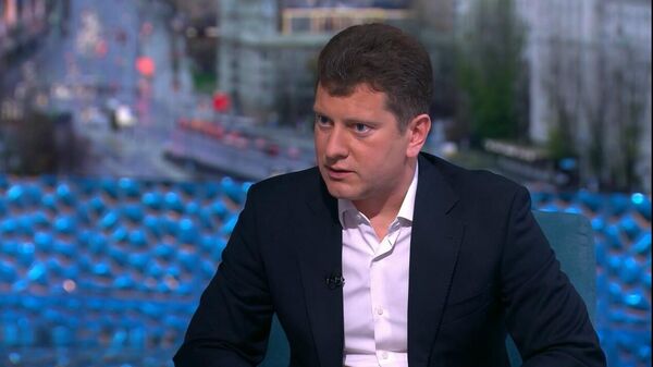 Доцент кафедры экономической политики и экономических измерений Института экономики и финансов ГУУ Максим Чирков - Sputnik Латвия