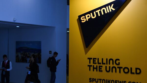 Логотип международного информационного агентства и радио Sputnik, архивное фото - Sputnik Латвия