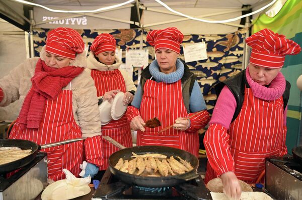 Как отмечали гости праздника, цены в этом году были рекордно высокими. - Sputnik Латвия