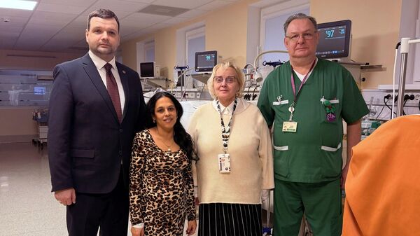 Министр благосостояния Рейнис Озолниекс (на фото - крайний слева)  - Sputnik Латвия