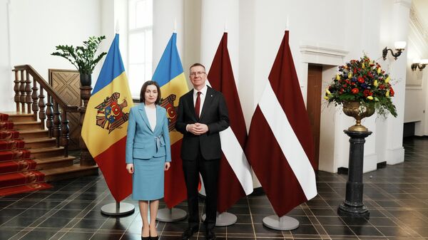 Президент Латвии Едгарс Ринкевичс и президент Молдавии Майя Санду - Sputnik Латвия