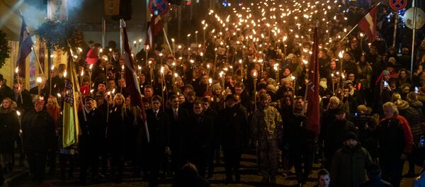 Факельное шествие 18 ноября в Риге Факельное шествие 18 ноября в Риге - Sputnik Latvija