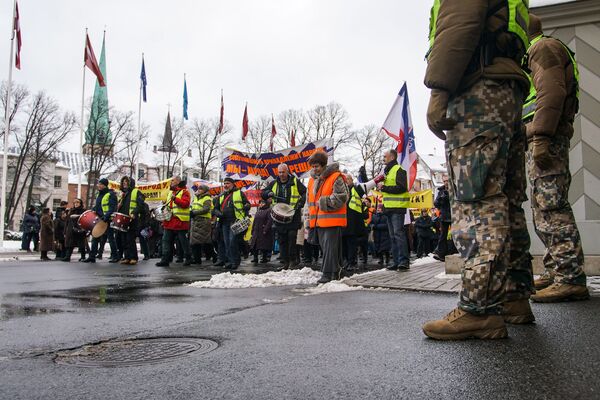 Акция протеста в Риге против социального и национального неравенства в Латвии. 12 января 2019 г. - Sputnik Латвия