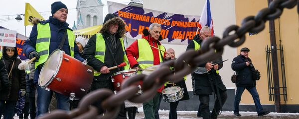 Акция протеста в Риге против социального и национального неравенства в Латвии. 12 января 2019 г. - Sputnik Латвия