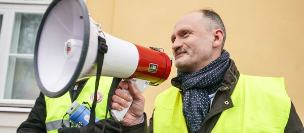 Мирослав Митрофанов на акции протеста в Риге против социального и национального неравенства в Латвии. 12 января 2019 г. - Sputnik Латвия