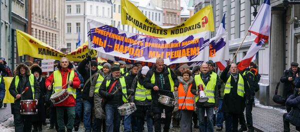 Акция протеста в Риге против социального и национального неравенства в Латвии. 12 января 2019 г. Акция протеста в Риге против социального и национального неравенства в Латвии. 12 января 2019 г. - Sputnik Латвия