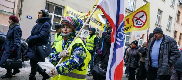 Акция протеста в Риге против социального и национального неравенства в Латвии. 12 января 2019 г. - Sputnik Латвия
