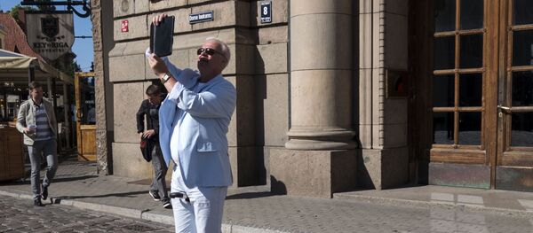 Турист в Латвии - Sputnik Latvija