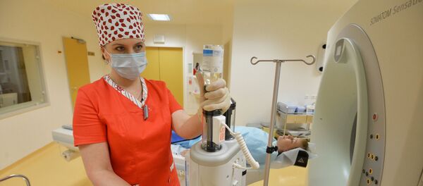 Обследование пациента на компьютерном томографе, архивное фото Обследование пациента на компьютерном томографе, архивное фото - Sputnik Латвия