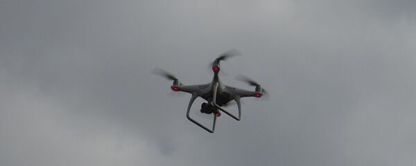 Дрон Bezvests.lv. ведет поиски пропавшего в Олайне регбиста Дависа Перконса Дрон Bezvests.lv. ведет поиски пропавшего в Олайне регбиста Дависа Перконса - Sputnik Latvija