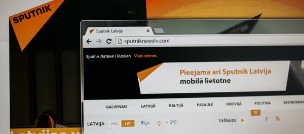 Монитор компьютера с сайтом Sputnik Латвия Монитор компьютера с сайтом Sputnik Латвия - Sputnik Latvija