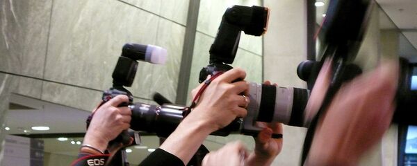 Фоторепортеры на пресс-конференции Фоторепортеры на пресс-конференции - Sputnik Latvija