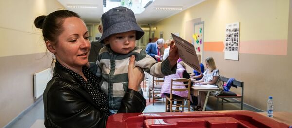 Голосование на выборах в Европарламент в Риге Голосование на выборах в Европарламент в Риге - Sputnik Латвия