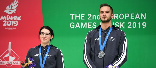 Агата Рушмане и Лаурис Страутманис, завоевавшие серебряные медали в соревнованиях по пулевой стрельбе из малокалиберного пистолета на II Европейских играх в Минске Агата Рушмане и Лаурис Страутманис, завоевавшие серебряные медали в соревнованиях по пулевой стрельбе из малокалиберного пистолета на II Европейских играх в Минске - Sputnik Латвия