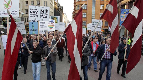 Шествие против приема беженцев прошло в Риге - Sputnik Латвия