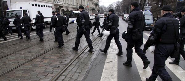 Сотрудники правоохранительных органов в Риге Сотрудники правоохранительных органов в Риге - Sputnik Латвия