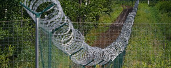 Забор на границе Латвии и России Забор на границе Латвии и России - Sputnik Latvija