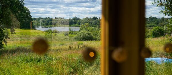 Вид на Даугаву из чайного домика Вид на Даугаву из чайного домика - Sputnik Латвия