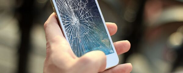 Разбитый телефон - Sputnik Латвия