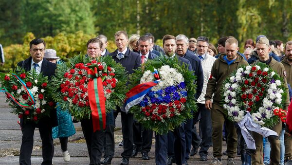 Памятная церемония, посвященная 75-й годовщине освобождения концентрационного лагеря в Саласпилсе - Sputnik Латвия