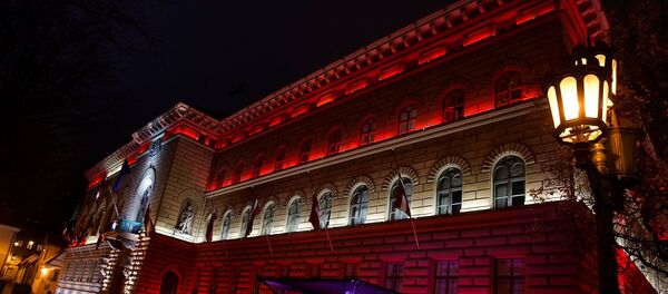 12-й фестиваль Staro Rīga. Световая инсталляция с голограммой  Янис Чаксте - 160 у здания Сейма - Sputnik Латвия