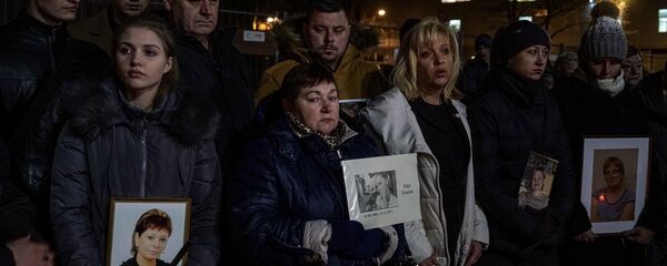 Рижане на месте обрушения магазина Maxima в шестую годовщину трагедии - Sputnik Латвия