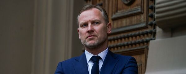 Акция протеста медиков у здания Сейма. Депутат Сейма Алдис Гобземс Акция протеста медиков у здания Сейма. Депутат Сейма Алдис Гобземс - Sputnik Latvija