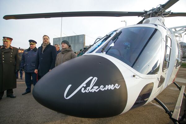 Глава МВД Латвии Сандис Гиргенс на церемонии приемки вертолетов AW 119 Kx - Sputnik Латвия
