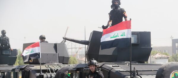 Бойцы спецподразделения по борьбе с терроризмом и военнослужащие на улице Багдада. Бойцы спецподразделения по борьбе с терроризмом и военнослужащие на улице Багдада. - Sputnik Латвия